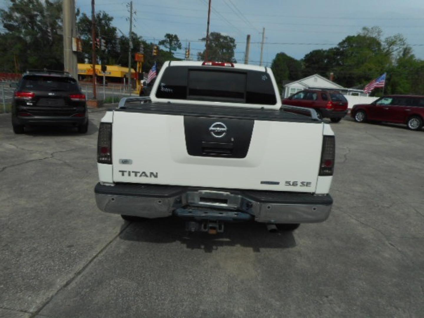 2010 WHITE NISSAN TITAN SE; LE; XE (1N6BA0ED7AN) , located at 10405 Abercorn Street, Savannah, GA, 31419, (912) 921-8965, 31.988262, -81.131760 - Photo#3